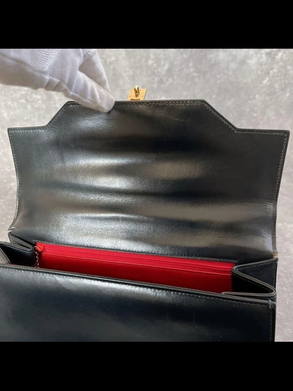 Gucci Black Leather Top-Handle Satchel with Gold Hardware Accent